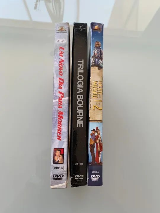 DVDs filmes 007 Um novo dia para morrer (DVD duplo) Uma noite no Museu 1 e 2 (DV - Foto 2