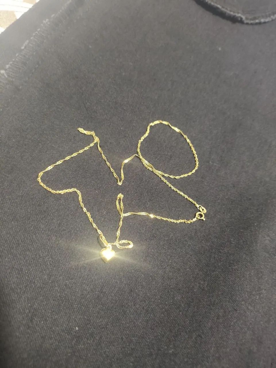 Vendo gargantilha de ouro 18k com pingente.