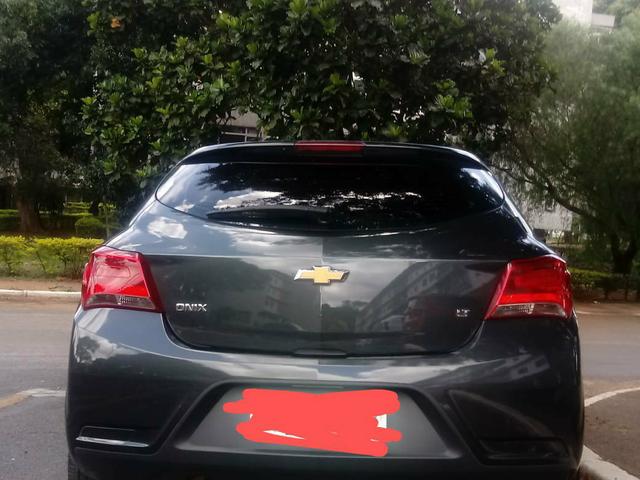 Onix lt1.0(financiamento) 20 mil - Foto 6
