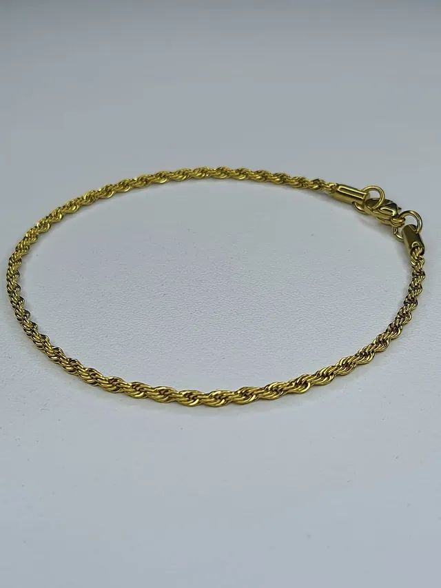 Pulseira dourada trançada 