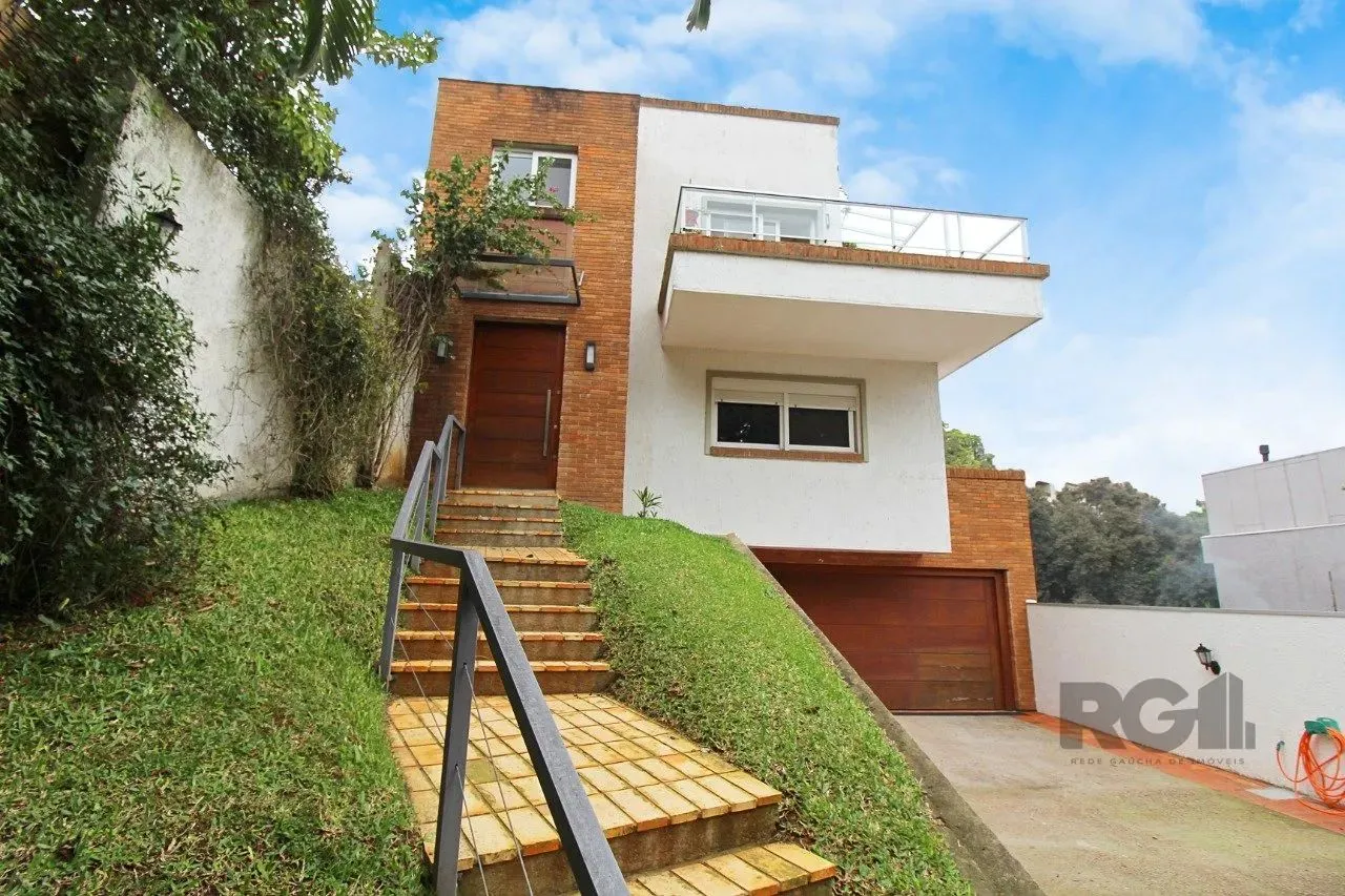 CASA COM 4 SUITES, 8 VAGAS E ELEVADOR NO BAIRRO SANTA TEREZA