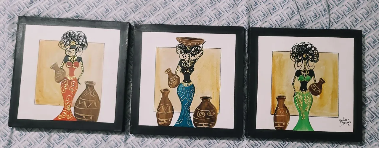 Três quadros decorativos com mulheres africanas