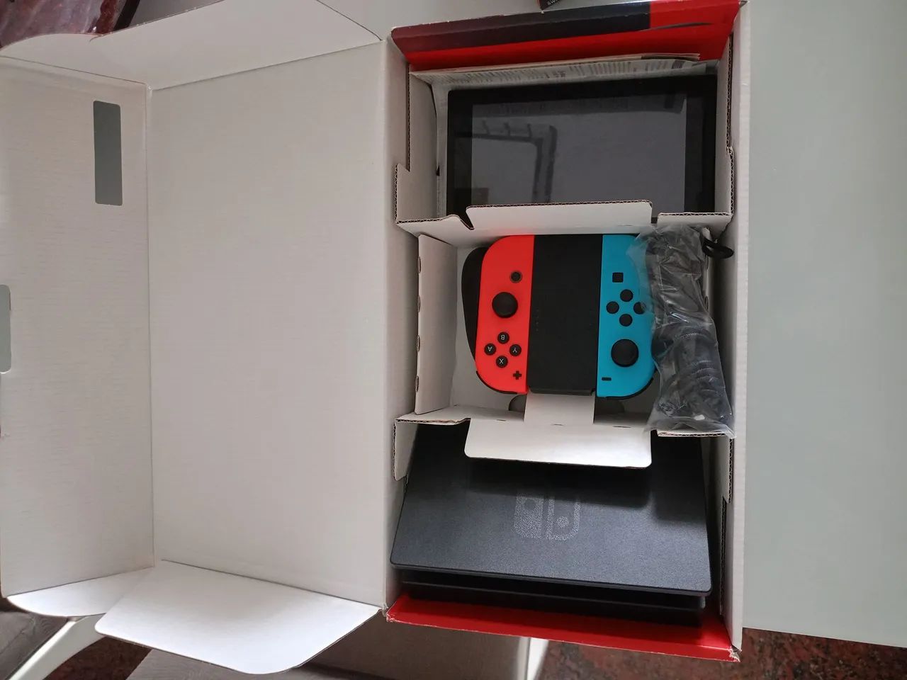 Vendo Nintendo switch semi novo junto com controle pro - Foto 4