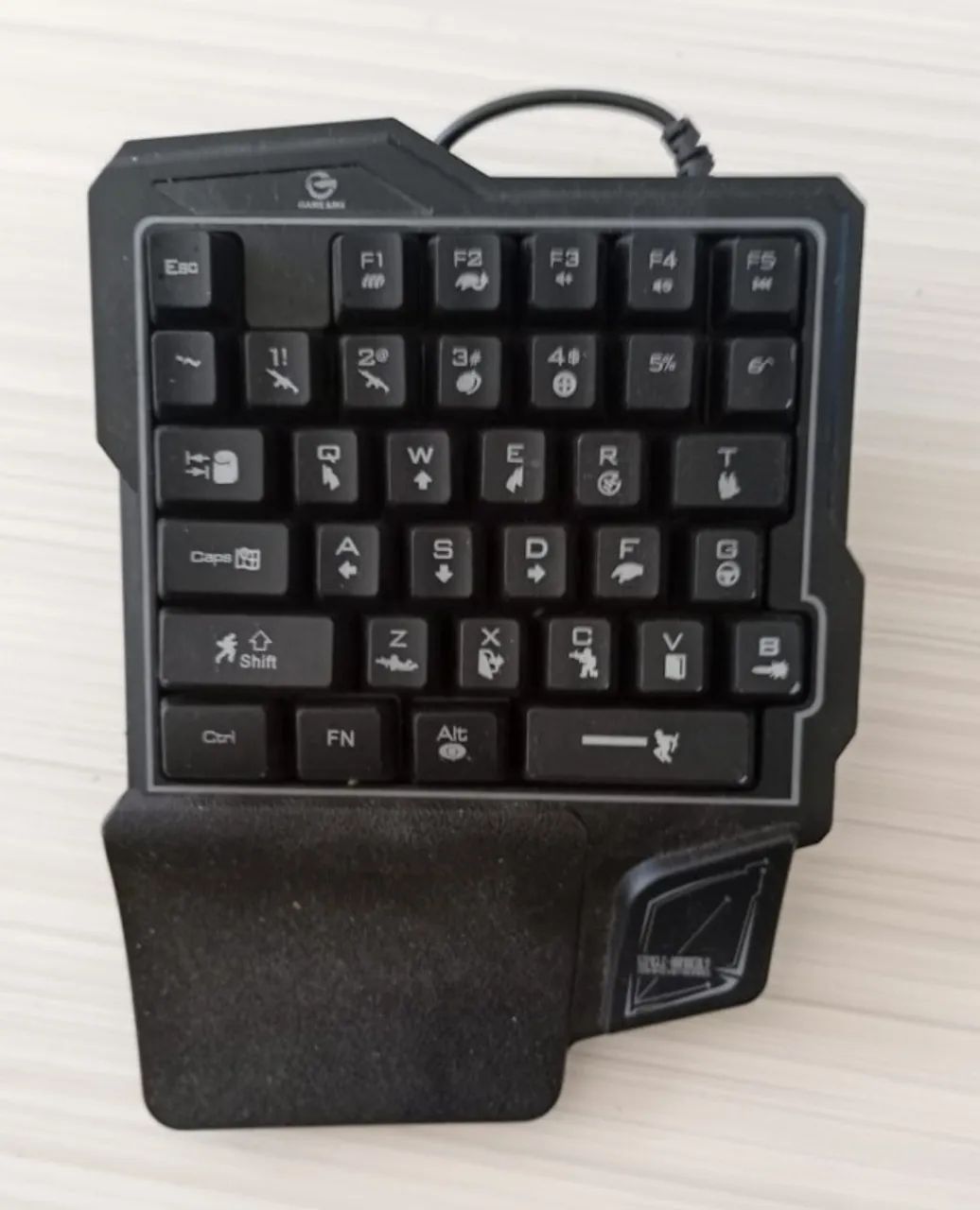 Teclado para jogar, para uma mão.