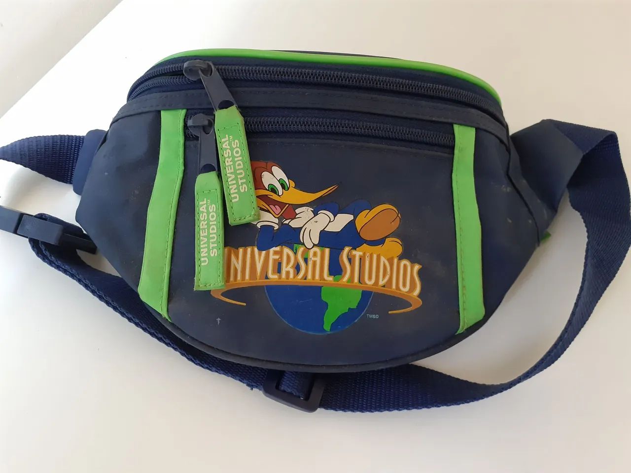 Bolsa pochete universal studios 