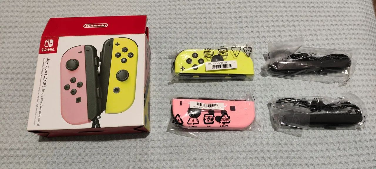 Joy con Nintendo switch na cor rosa e amarelo pastel  - Foto 2