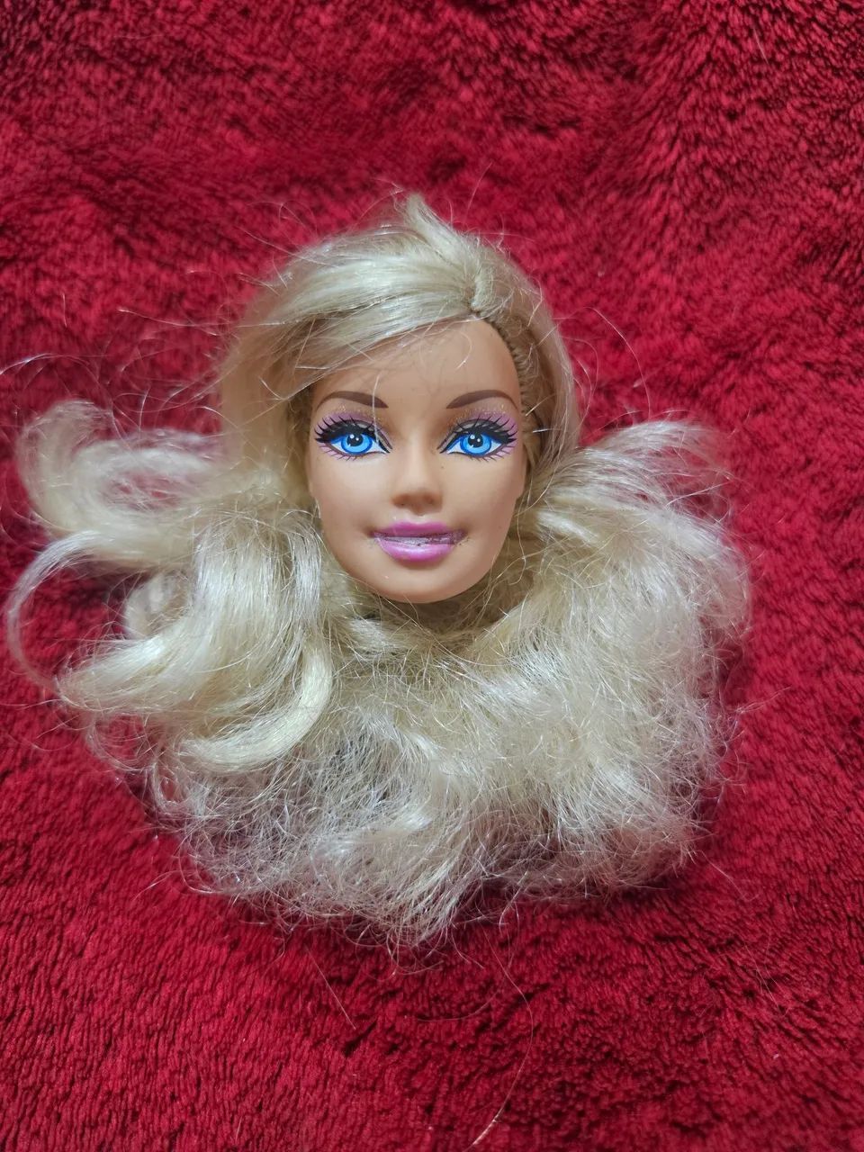 Cabeça de boneca barbie