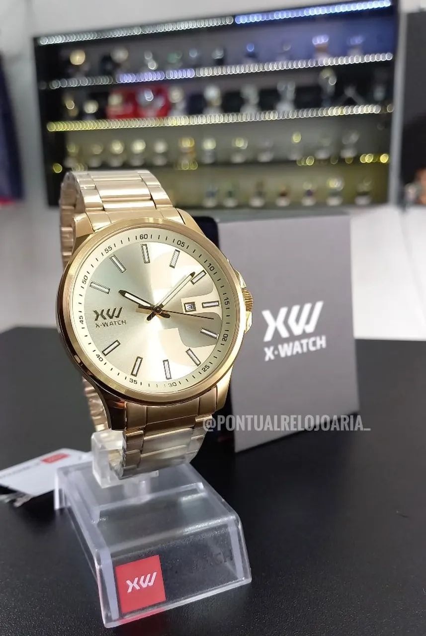 Relógio x-watch dourado original  - Foto 2