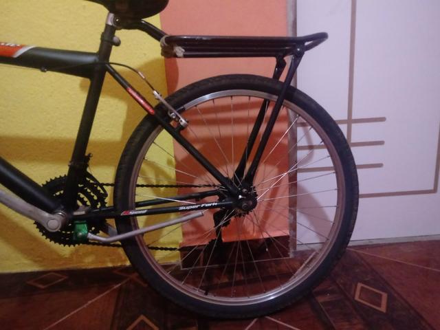 Vendo uma bicicleta semi-nova da Caloi 200 - Foto 6