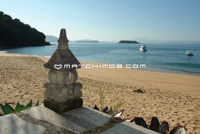 Pé na areia na Praia Vermelha em Angra dos Reis
