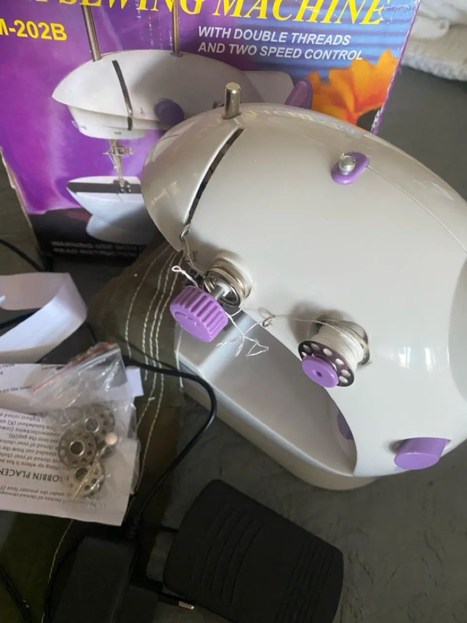 Mini máquina de costura64312211262593122