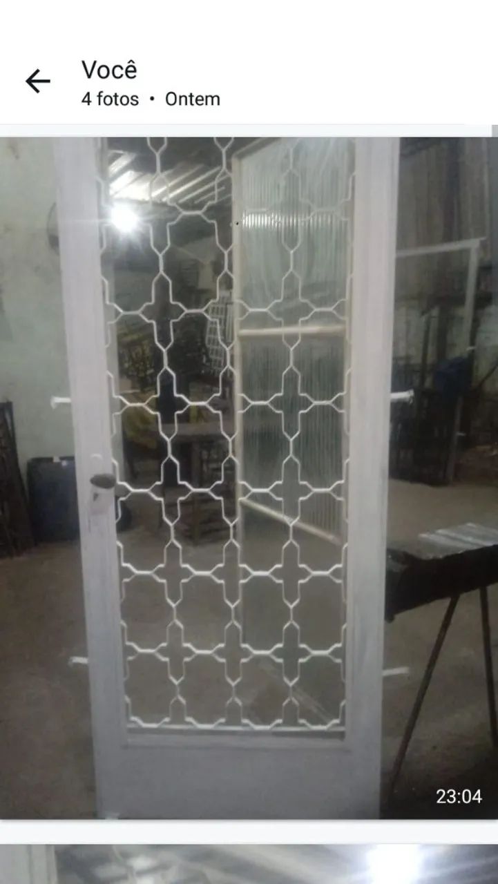 Ornately crafted door with a small side door64750513810946120