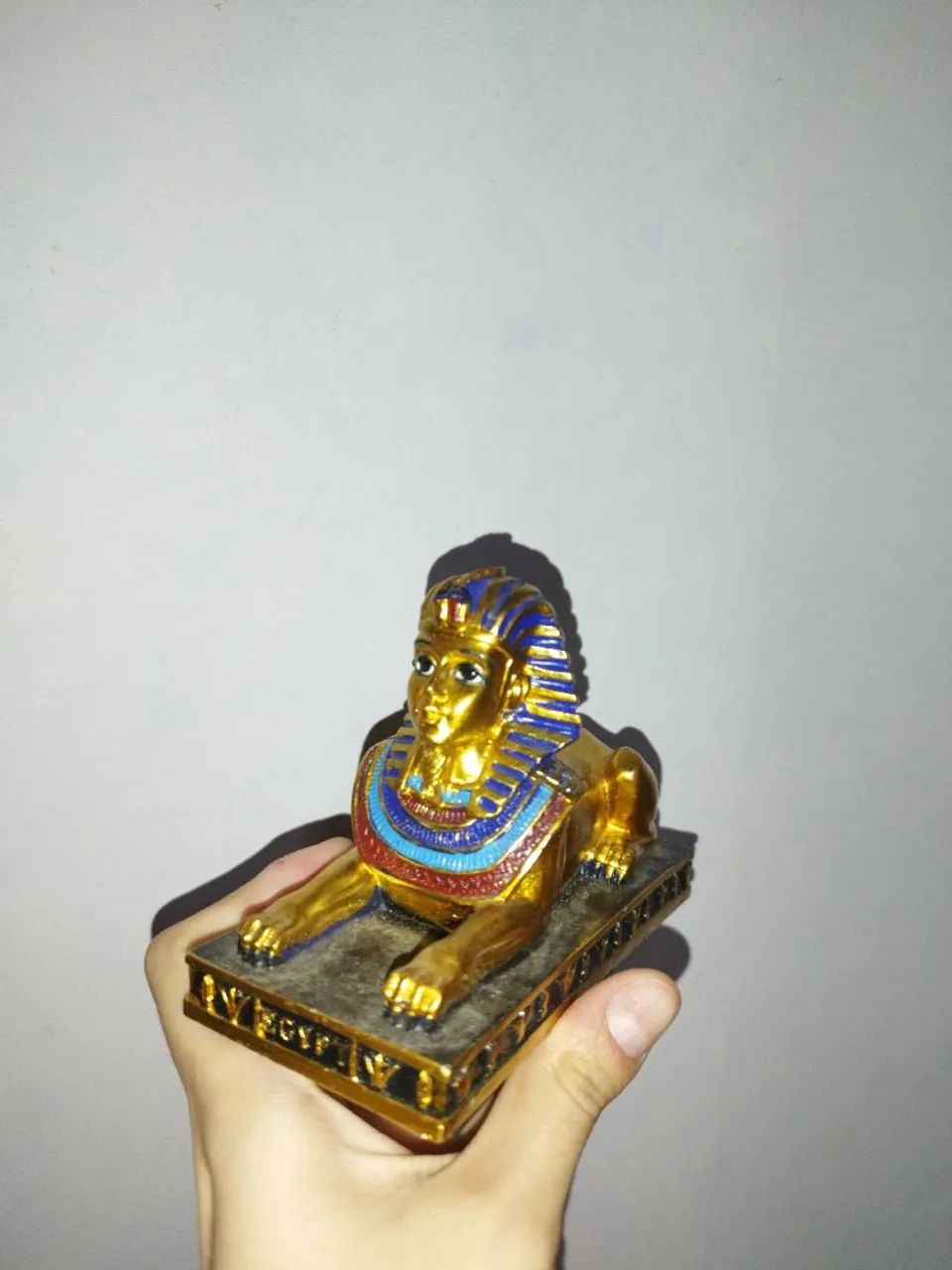 Escultura Egípcia de Esfinge folhada a ouro 