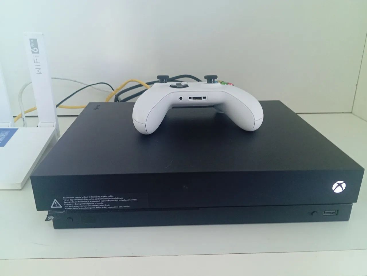 Xbox One X seminovo - Consoles de Vídeo Game - De Lourdes