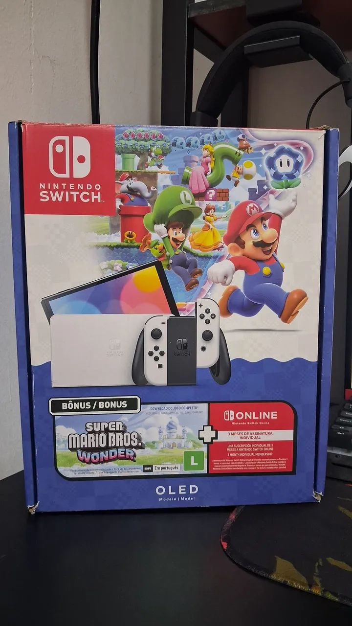 Caixa e acessórios originais de Nintendo Switch Oled Edição Mario Wonder