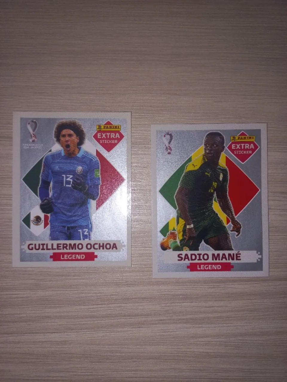 Figurinhas extra prata Guillermo Ochoa e Sadio Mane copa do mundo 2022