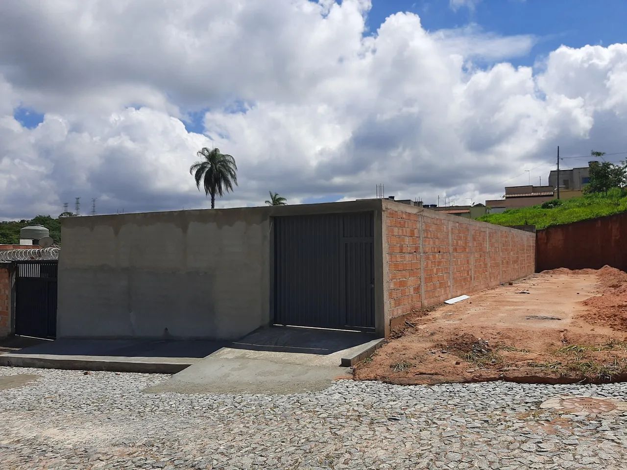 Vendo lote com casa em construção 