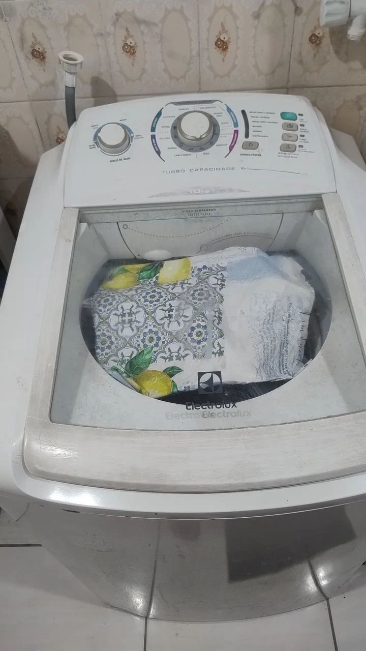 Máquina de lavar com defeito