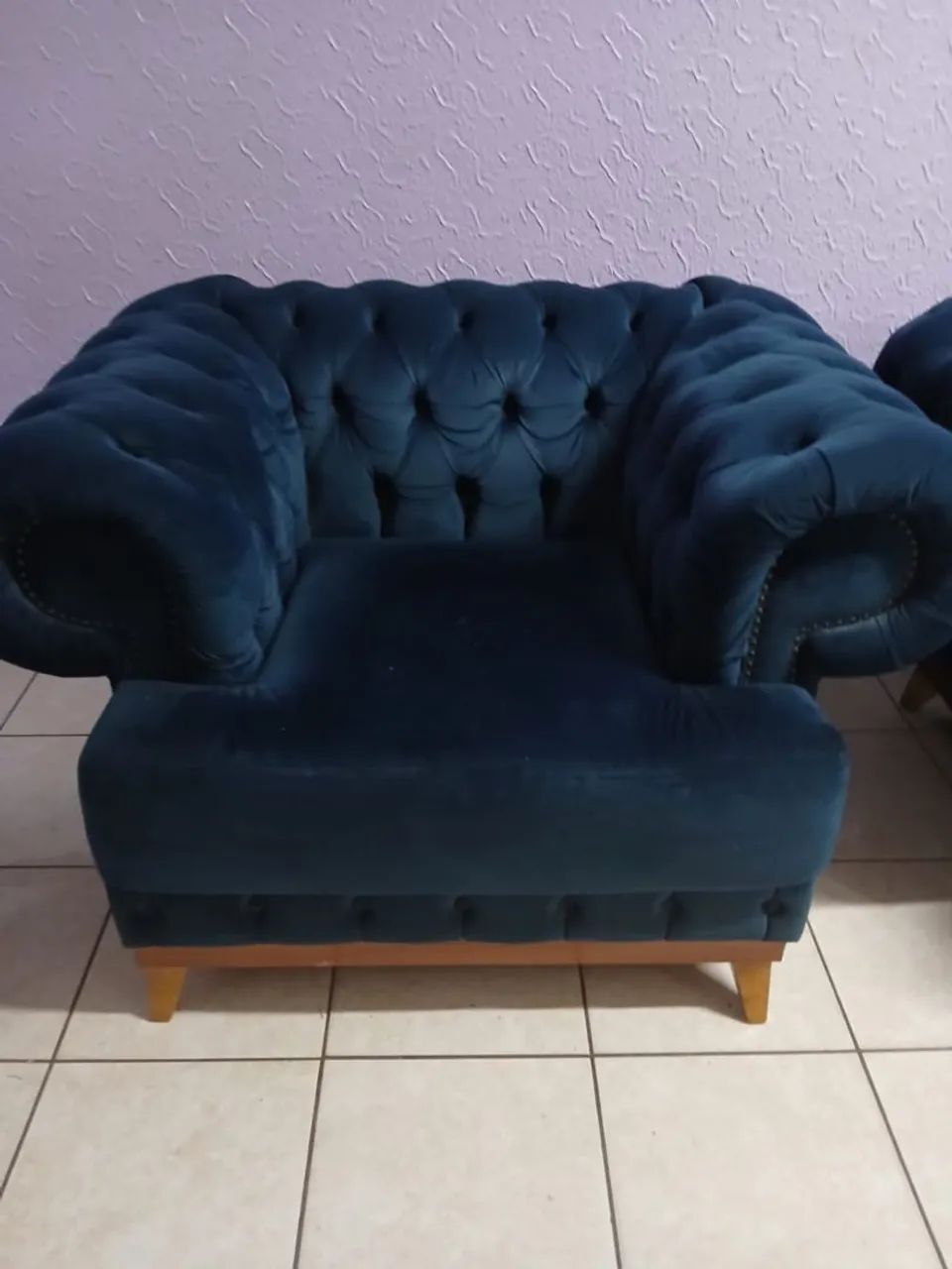 Selling luxury button-tufted armchairs in navy blue