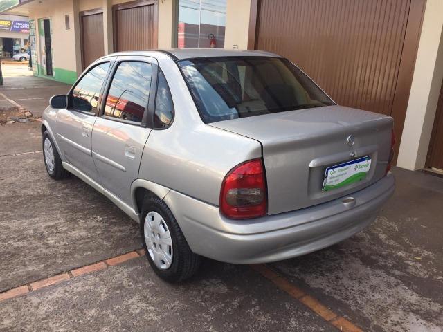 Gm/corsa sedan classic 1.0 (vidro,trava, alarme e som ) - Foto 7