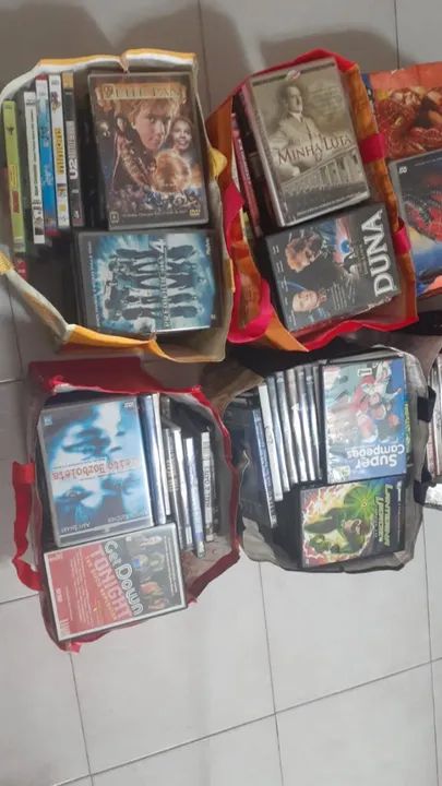 Mais de 150 CDS de DVDS de filmes, desenhos e showns de bandas musicais - Foto 3