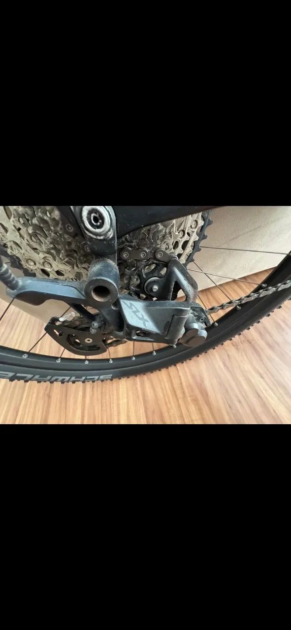 Caloi Elite Carbon Sport 2025 - Mountain bike carbono leve com transmissão Shimano SLX