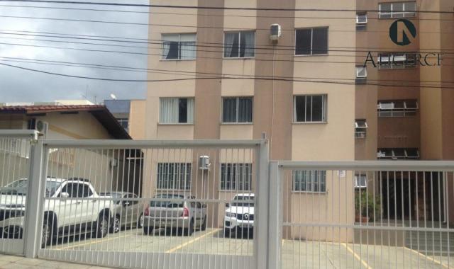 Imóvel com três dormitórios e sala ampla. condomínio tranquilo. - Foto 5