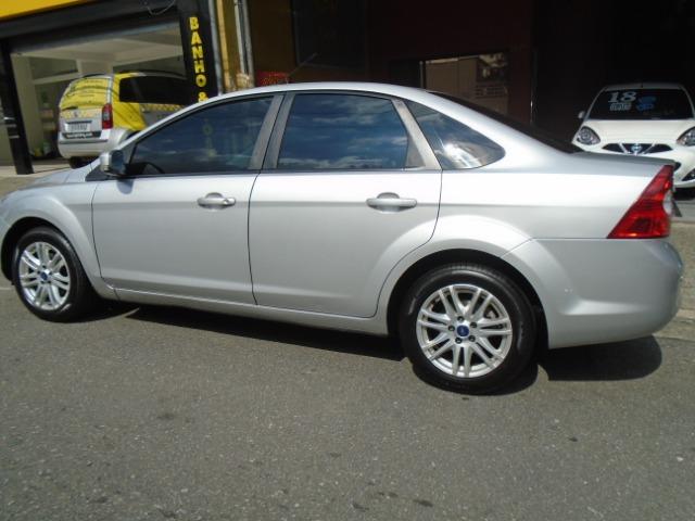 Focus sedã 1.6 flex 81.000 km Novo! 2013 único dono - Foto 6