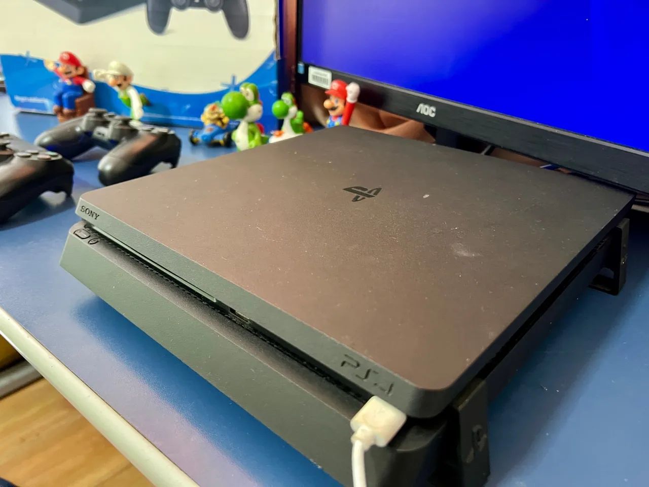 PS4 Slim 1TB - Console + 4 jogos - Foto 4