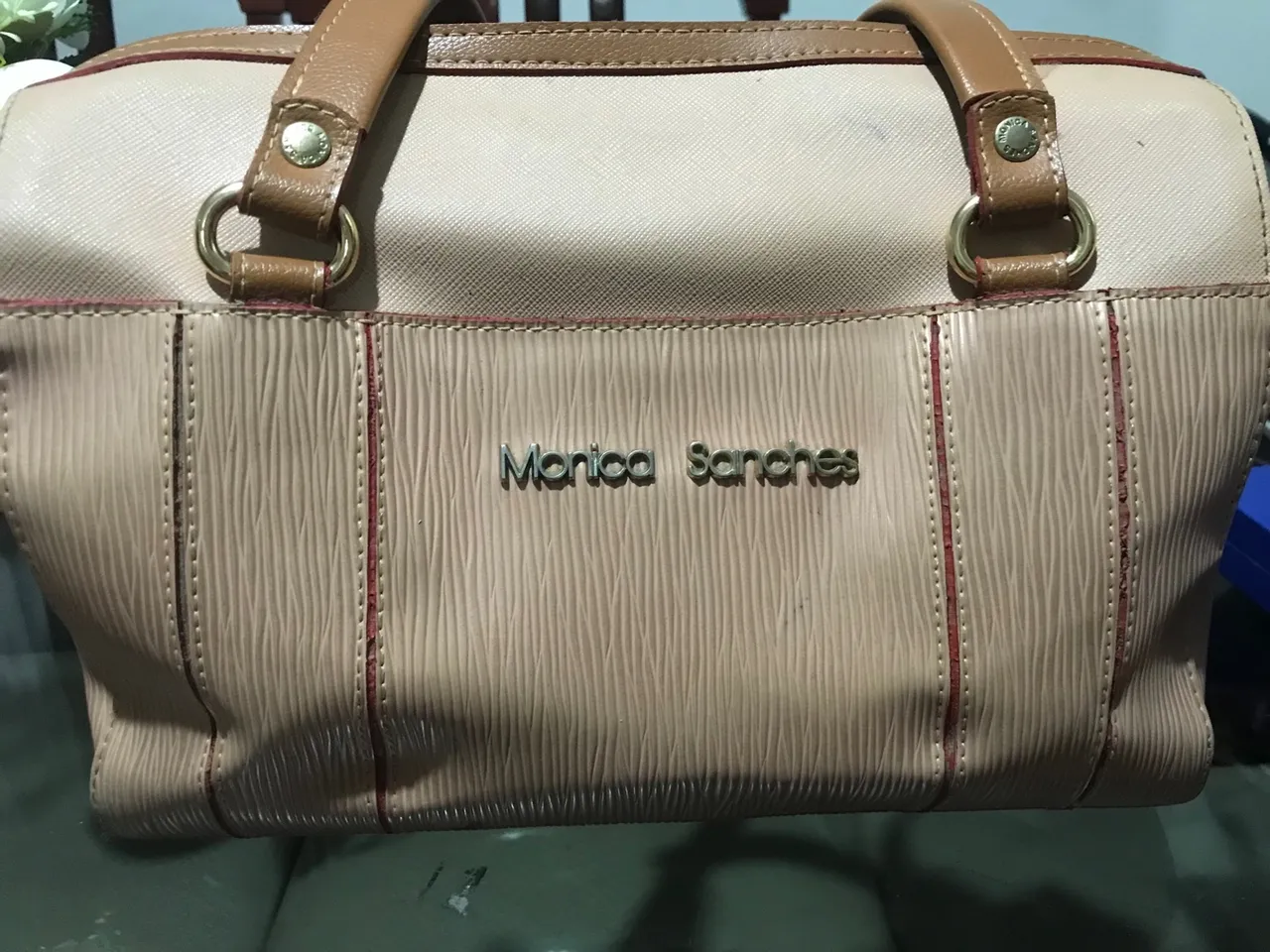 Bolsa Mônica Sanches com avarias