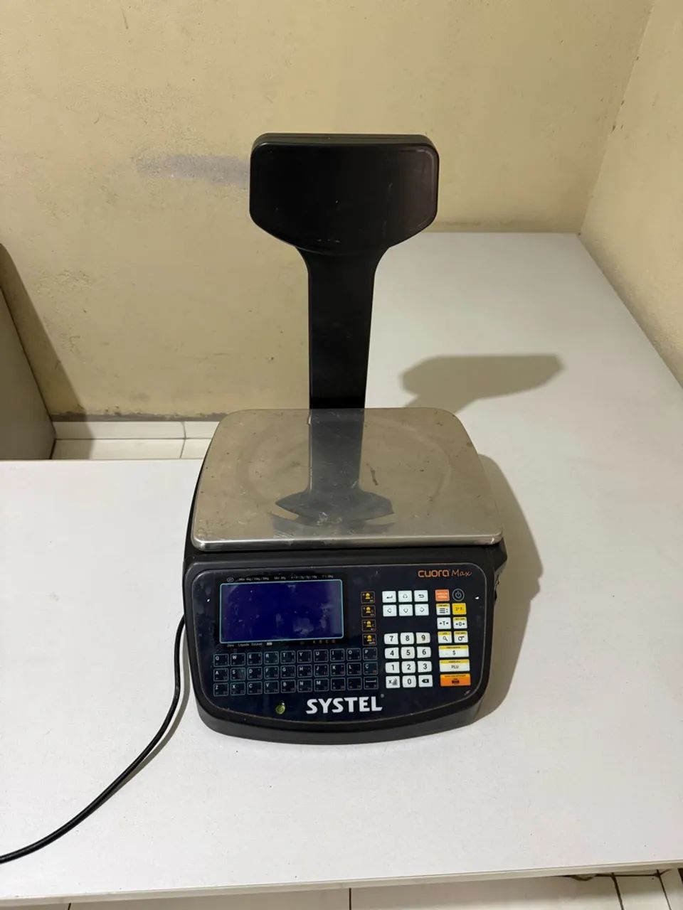 Balança systel com etiqueta 