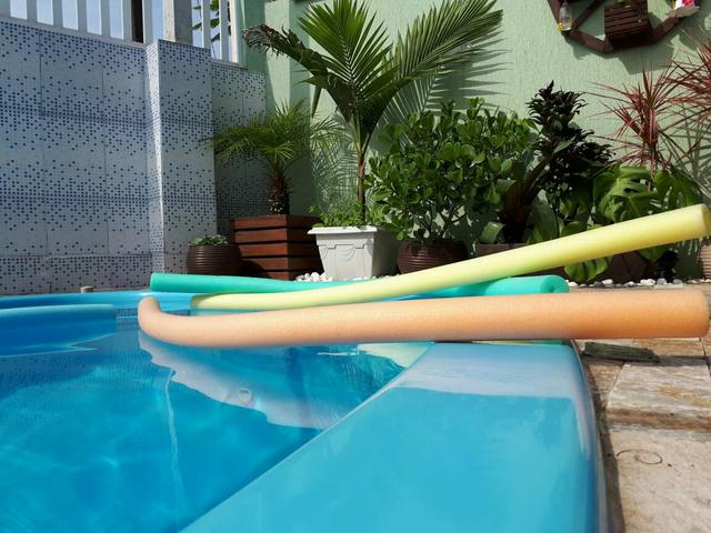 Belíssima casa com piscina em Matinhos - Foto 11