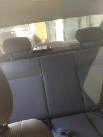 Vendo Voyage carro de boa procedência e nada a fazer - Foto 13