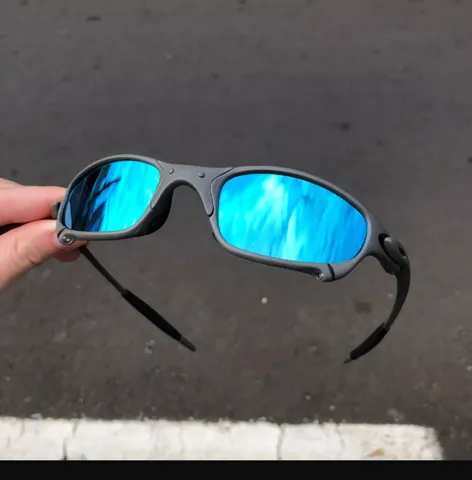 Oculos de Sol Oakley Juliet Xmetal Vermelha Double X Mandrake no