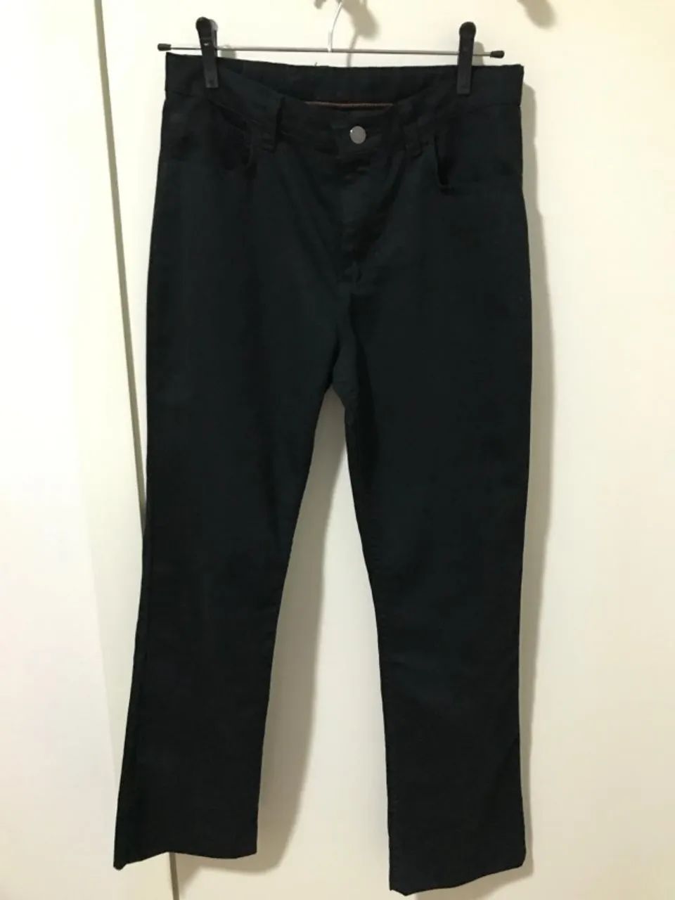 Calça Wrangler preta pouco uso.