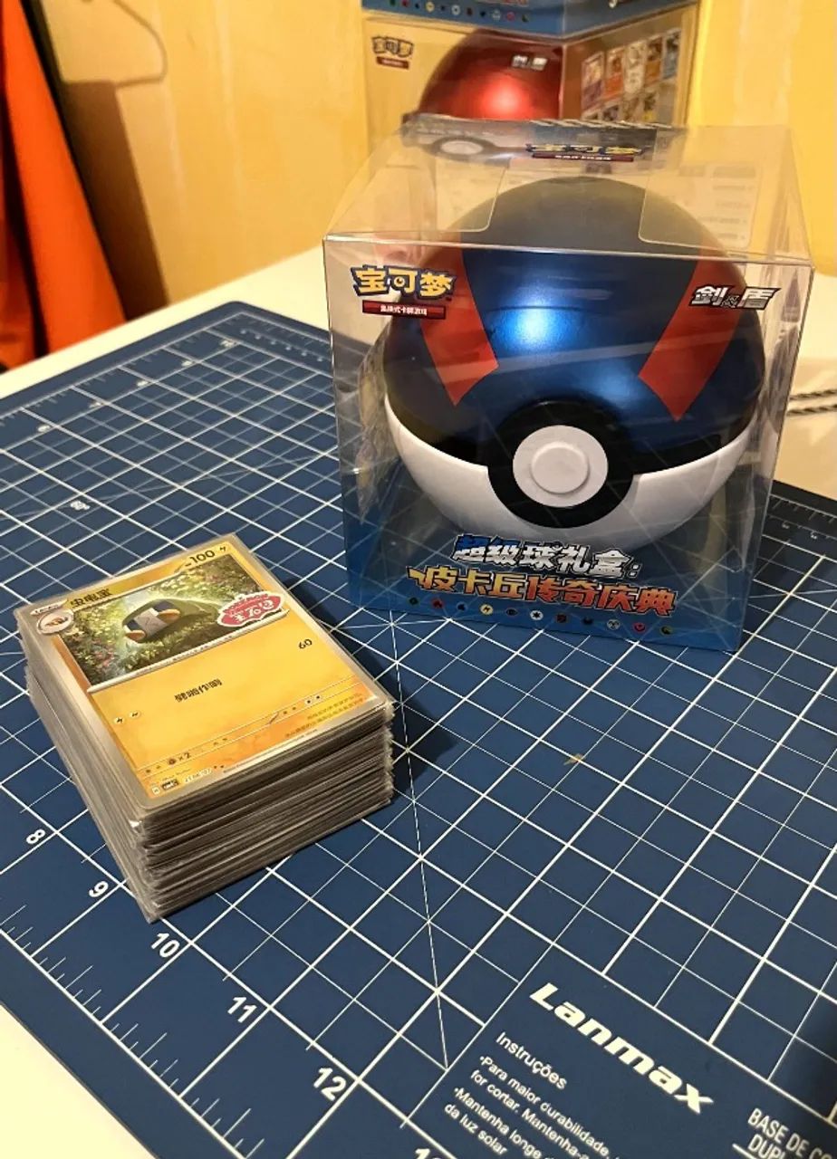 Lote Cartas + Lata Pokémon OFICIAL China - Foto 2
