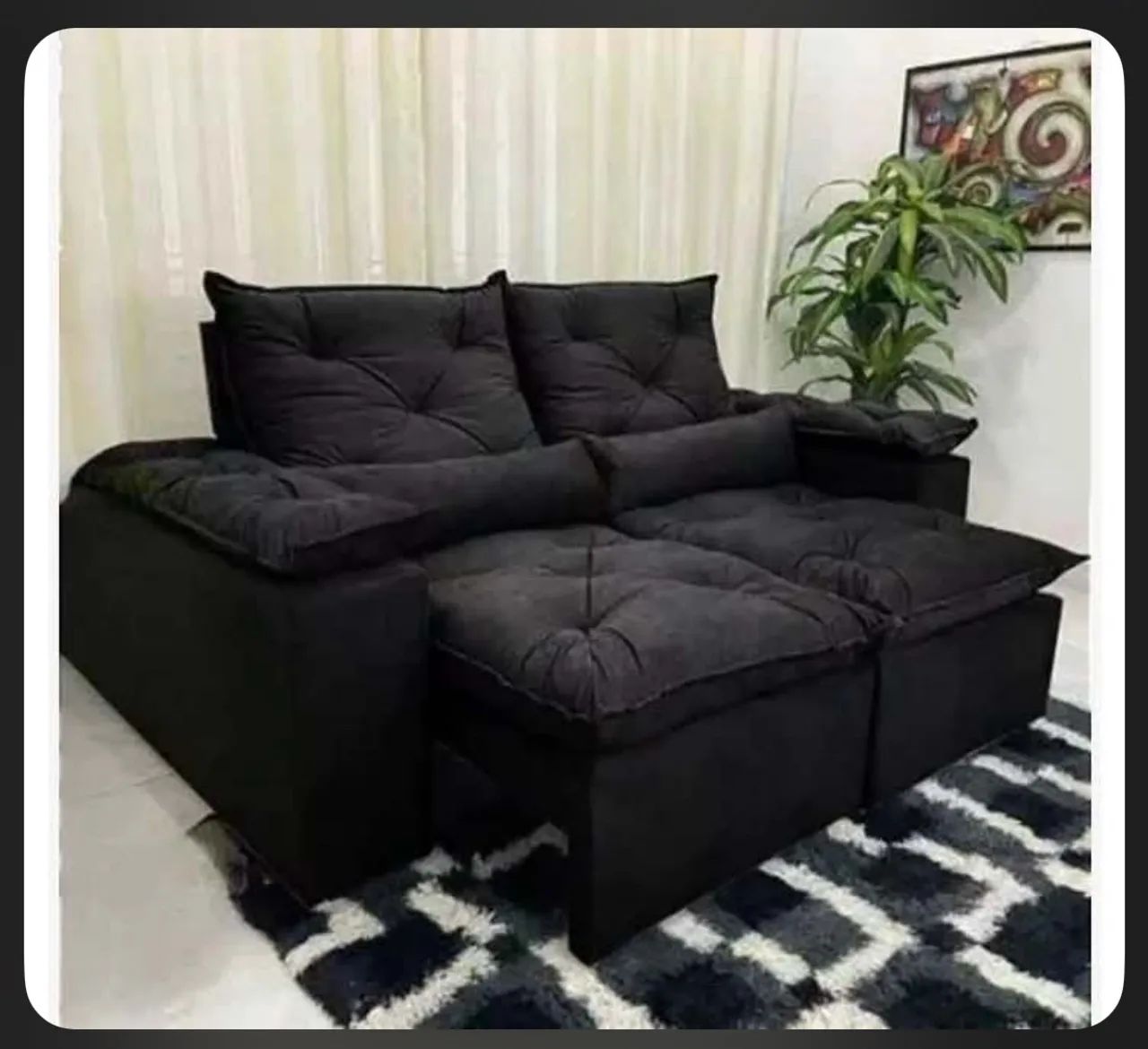 Sofá preto retrátil 