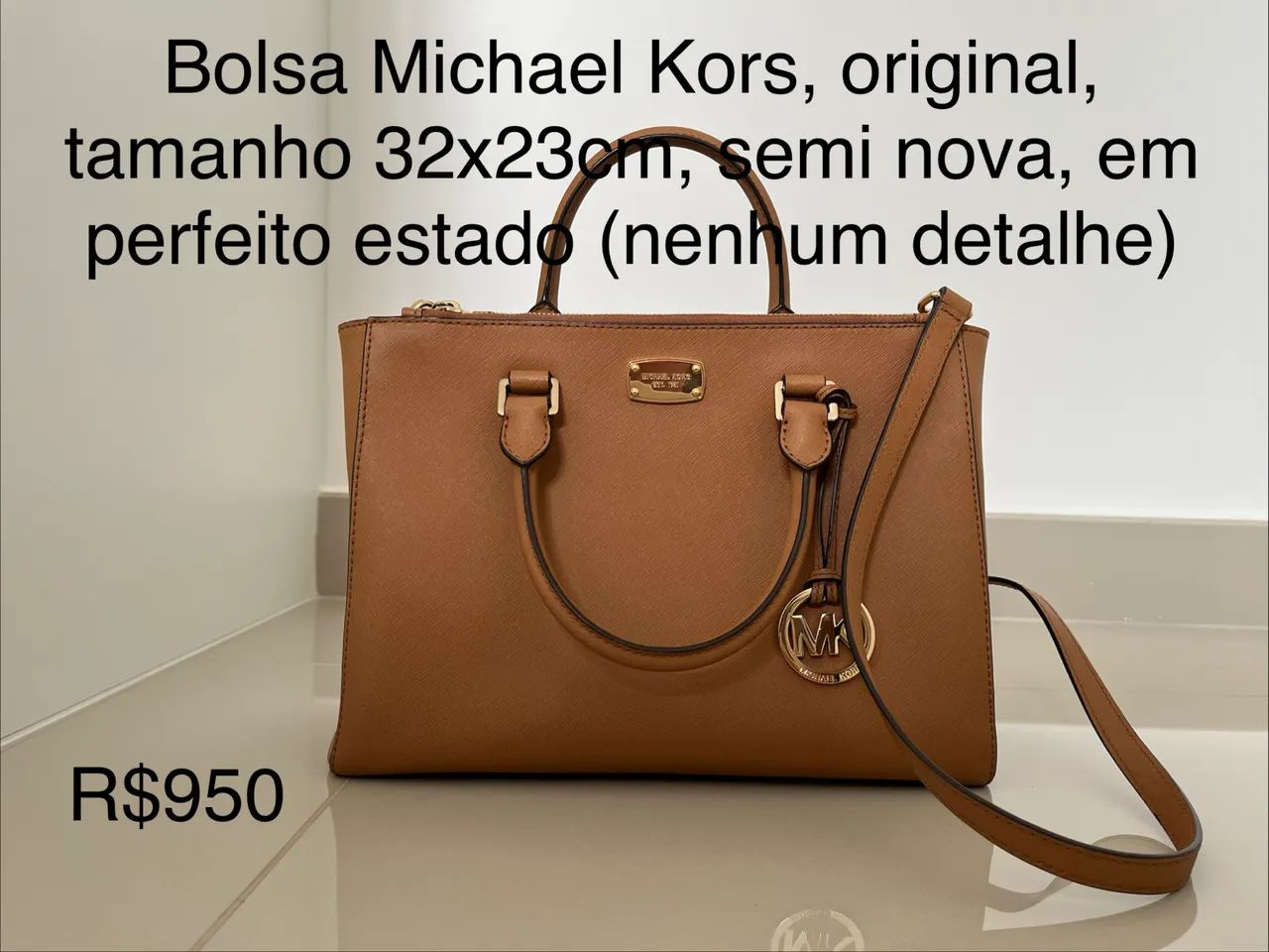 Bolsa Michael Kors semi nova 