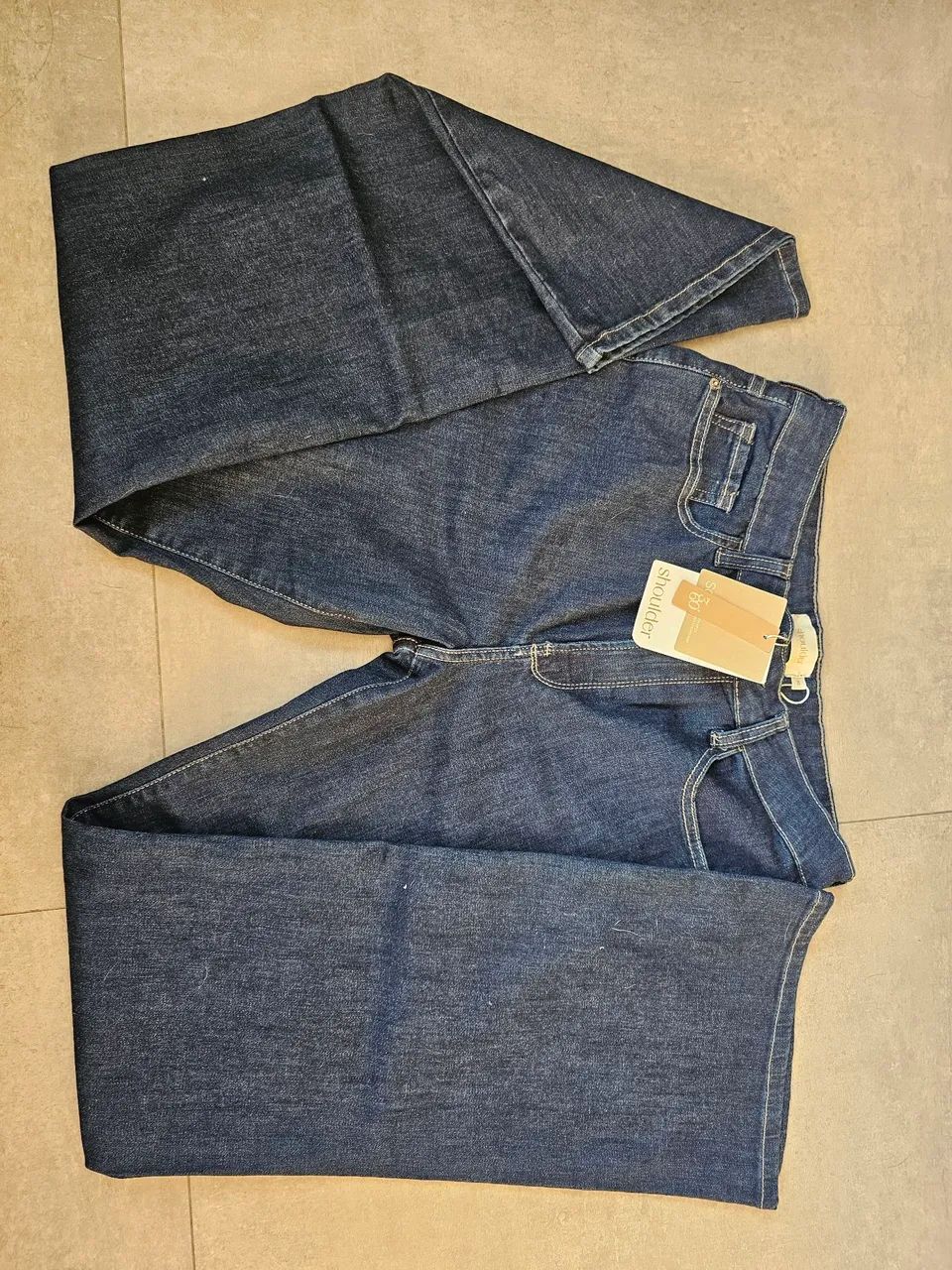 Calça Jeans Flare Shoulder - Nova com Etiqueta - Foto 5