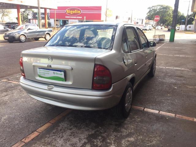 Gm/corsa sedan classic 1.0 (vidro,trava, alarme e som ) - Foto 5