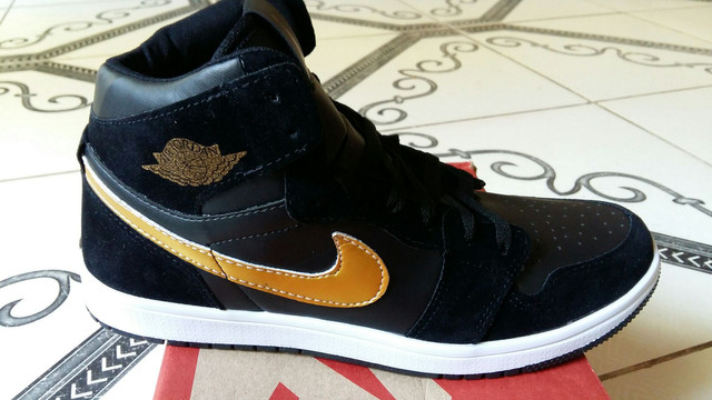 jordan preto e dourado