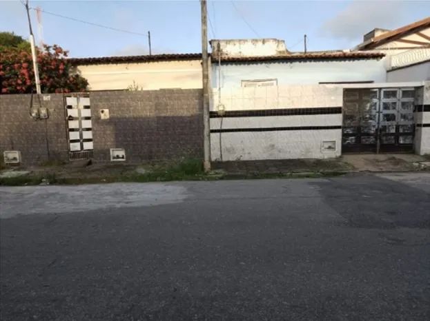 Vendo terreno com 3 casas 