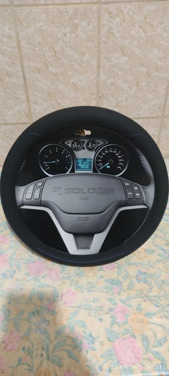 Capa de volante de automóveis 