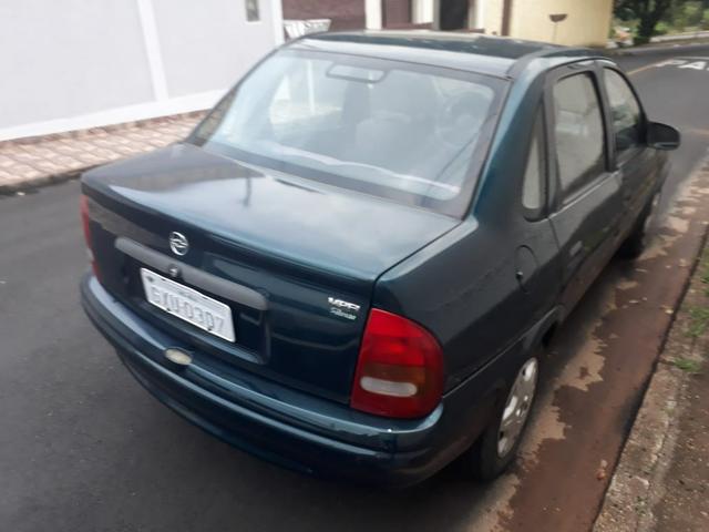 Corsa sedan - Foto 3