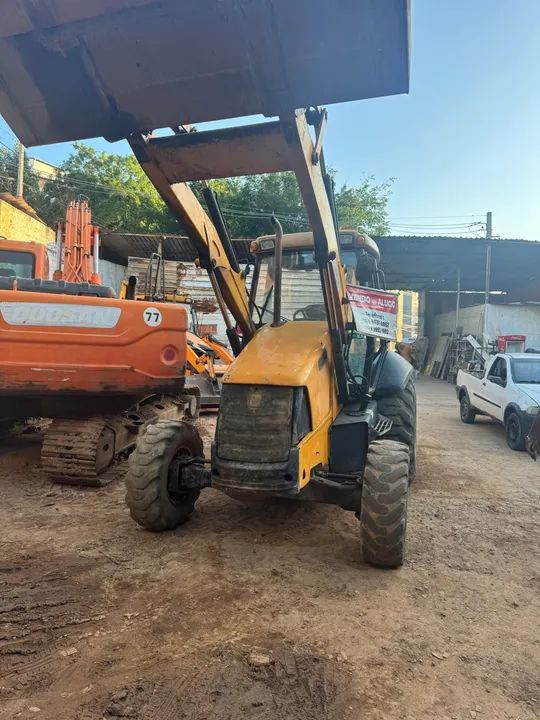 Retroescavadeira 4x4 - Foto 6