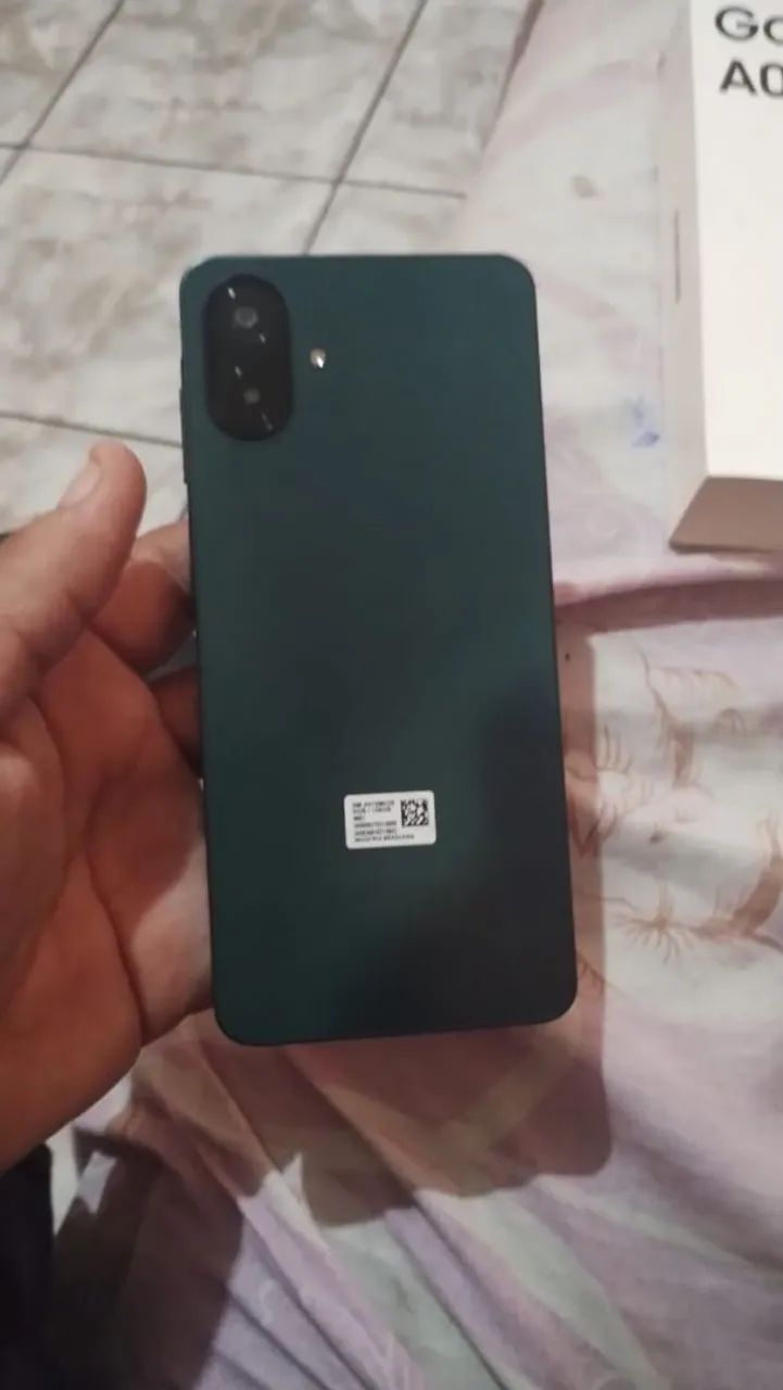 Celular na caixa com documento e seme novo 