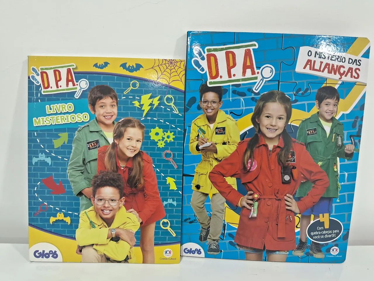 Livro e quebra cabeça DPA detetives do predio azul