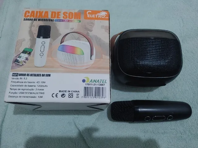 Caixa de som com microfone