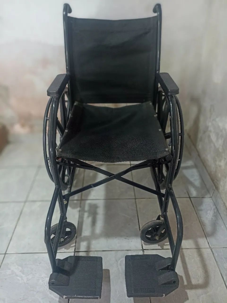 Cadeira de roda.