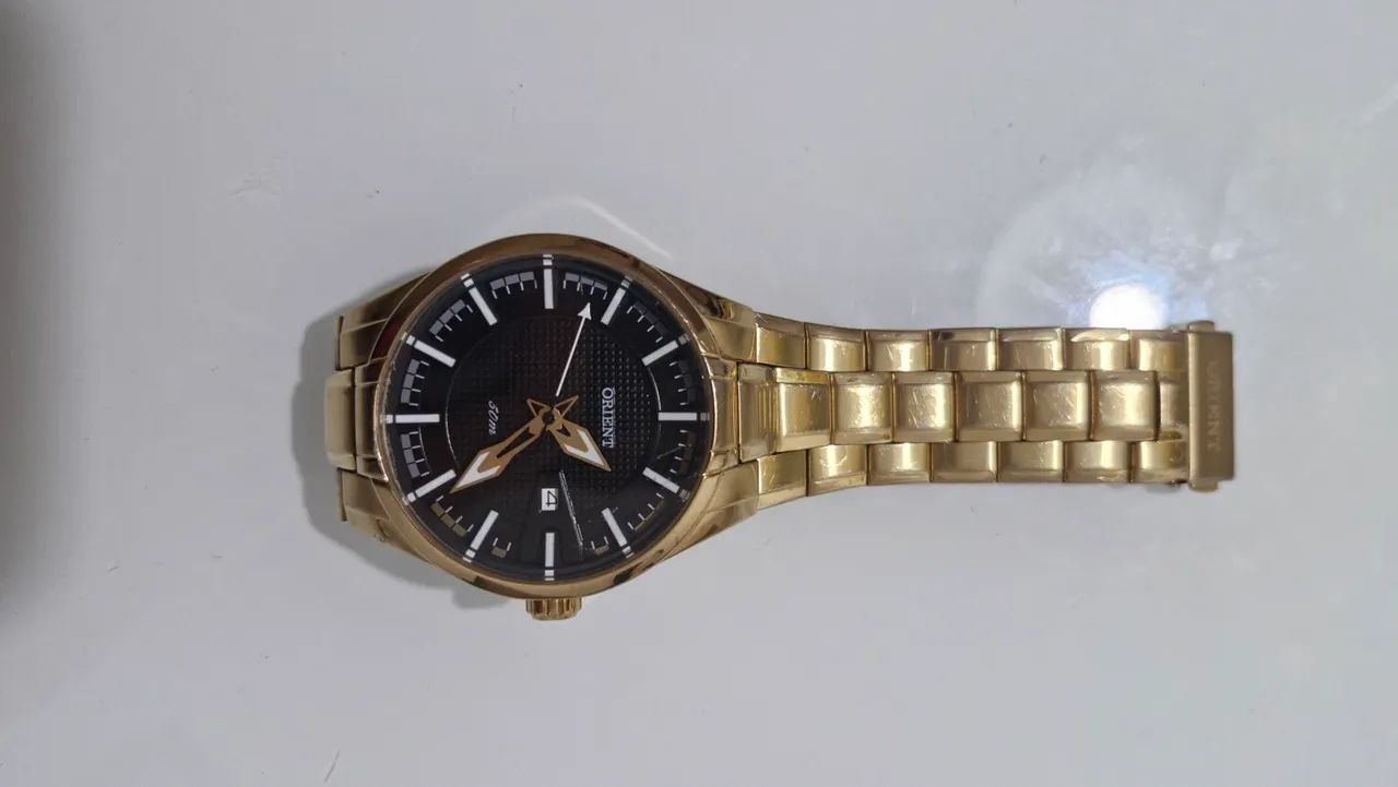 Relógio ORIENT dourado original banhado. - Foto 2